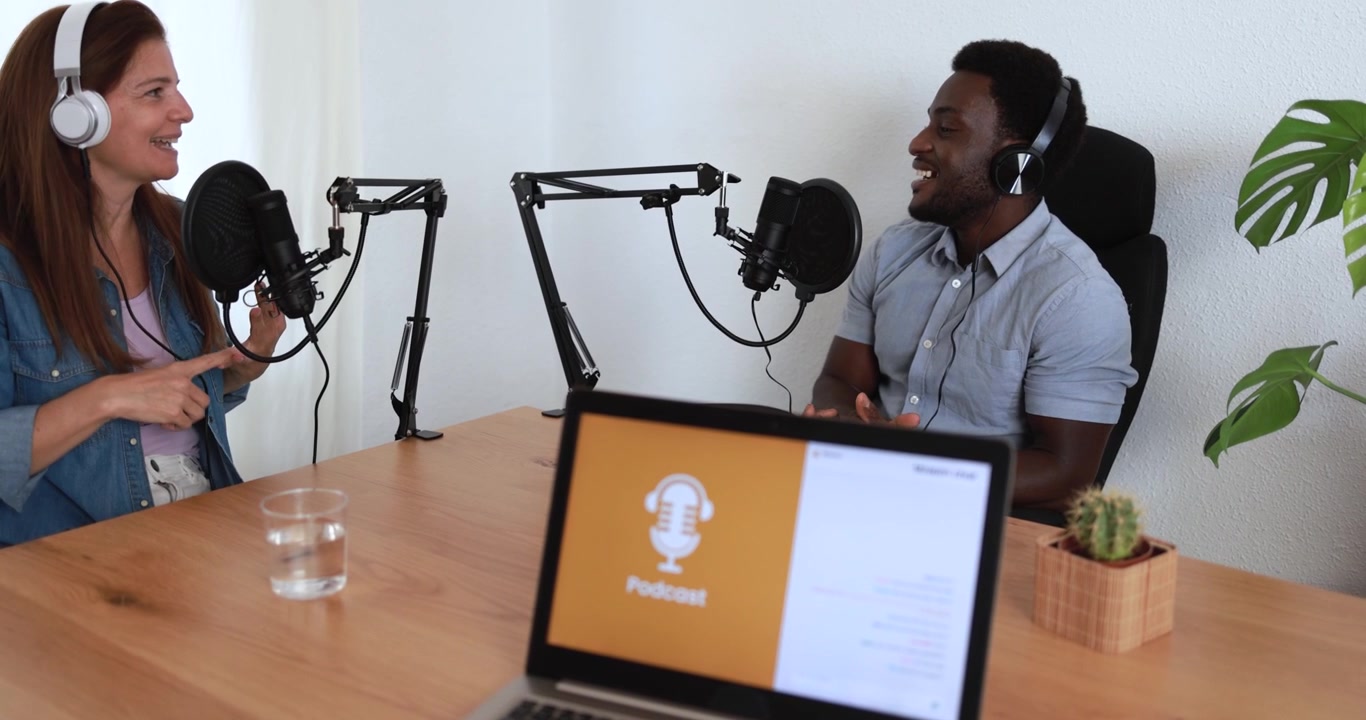 Two People Recording a Podcast in a Home Studio