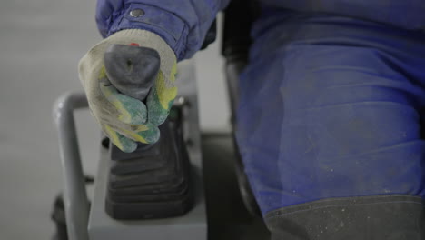 construction worker operating a machine