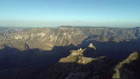 aerial wide shot of the urique canyon at sunset in divisadero, copper canyon region, chihuahua