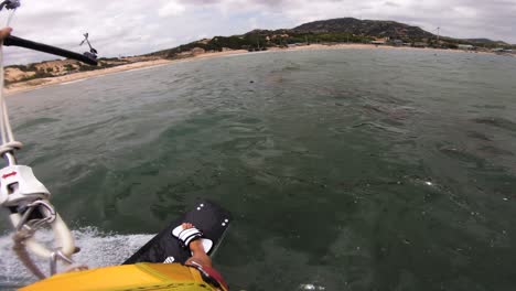 beautiful first person pov shot of kitesurfer riding through polluted sea kitesurfing with kitesurf