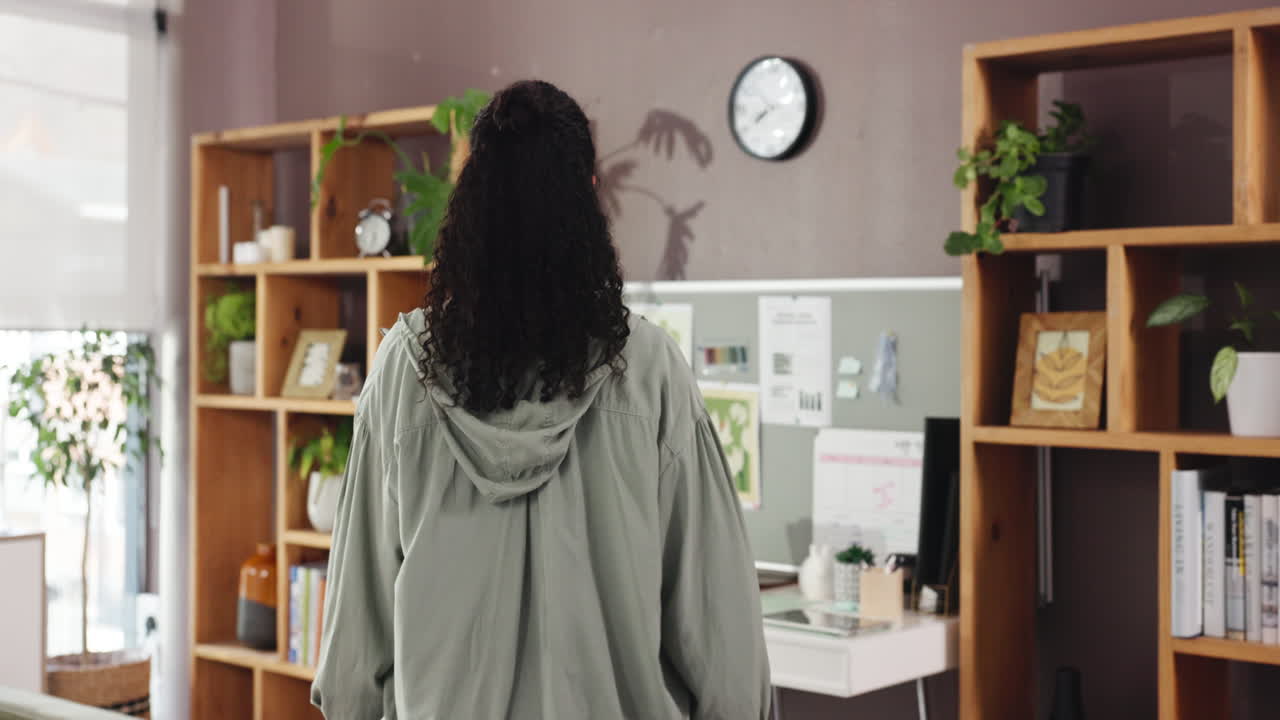 Woman working at desk with laptop