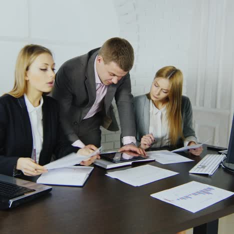 young professionals at office desk