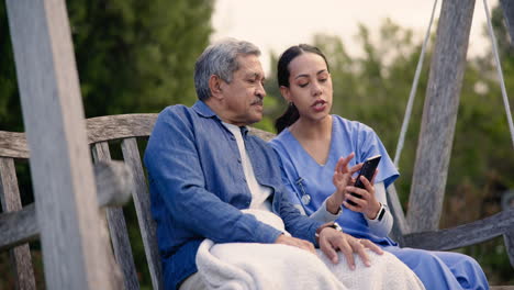 nurse, phone and talking to senior man outdoor