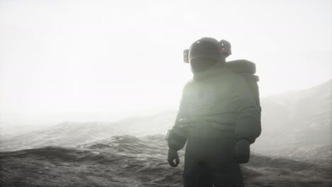 astronaut on another planet with dust and fog