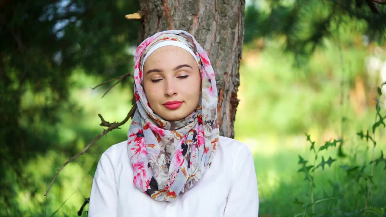 Young Woman in Hijab in a Park