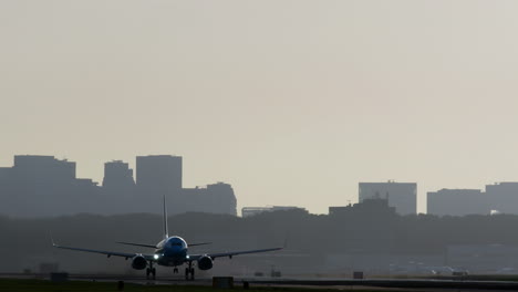 airplane taking off or landing near a city