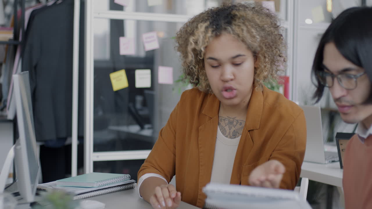 Two people in a business meeting