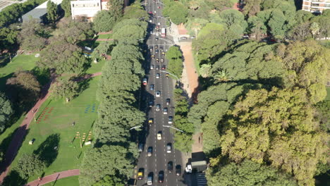 AERIAL---Recoleta-Libertador-Avenue,-Buenos-Aires,-Argentina,-wide-lowering-shot