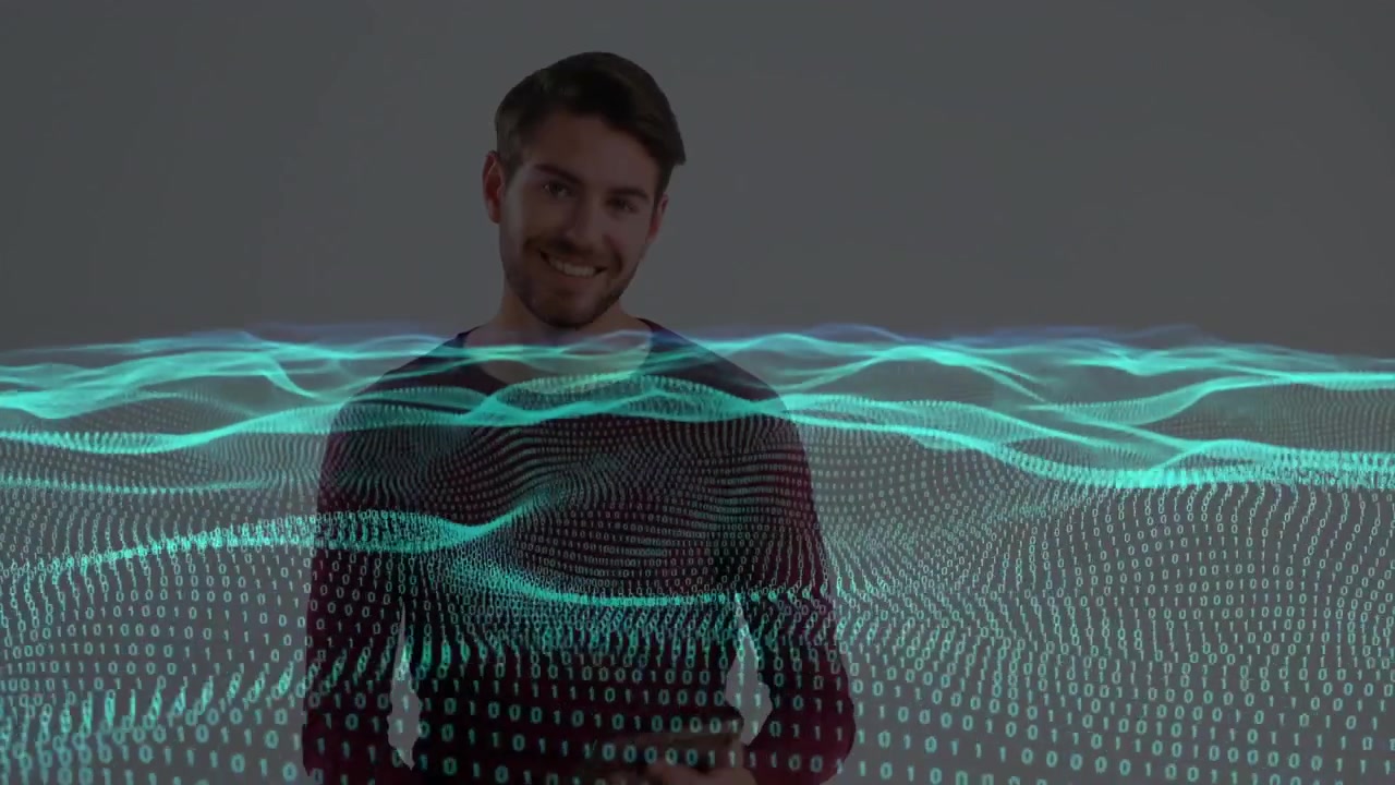 Young Man Using Tablet with Digital Data Visualization Overlay