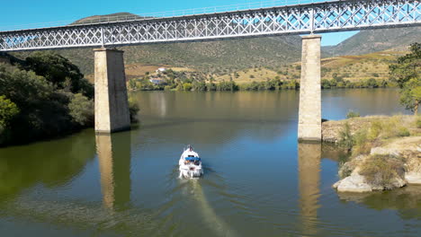 boat going under a bridge