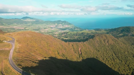 sao miguel island natural scenery, sprawling verdant mountain hills with furnas lagoon in the distance