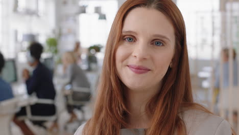 portrait red head business woman smiling happy entrepreneur enjoying successful startup company proud manager in office workspace