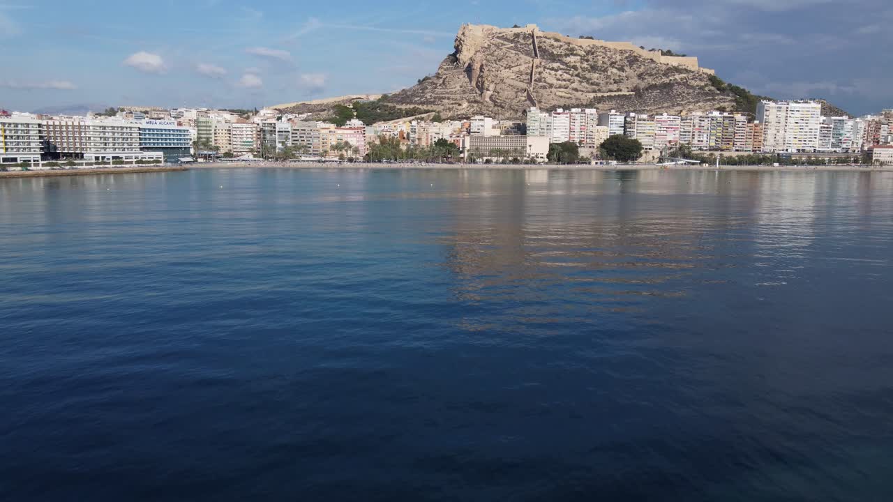 Stunning View of a Coastal City with a Mountaintop Castle