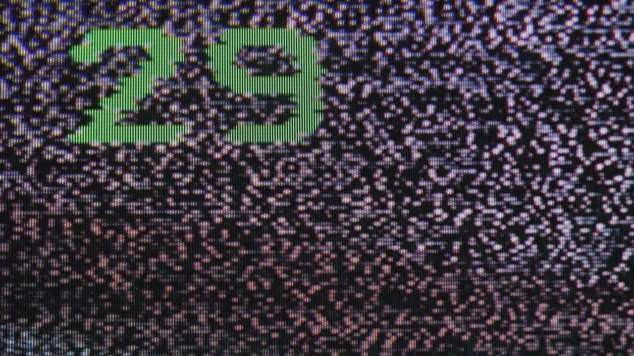 Green Pixelated Numbers Counting on TV Static Screen