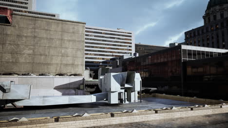 a view of a cityscape with a metal structure on a rooftop