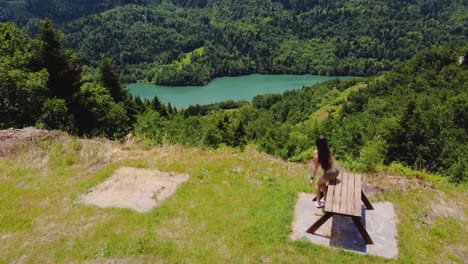 girl-walks,-sits-on-a-bench-and-sees-the-view