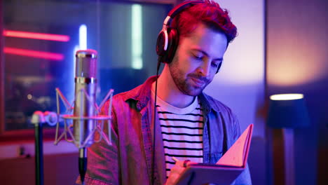 man recording music in a studio