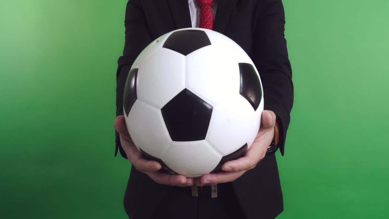 Businessman Giving A Soccer Ball, Video In 4K