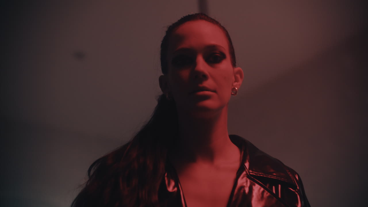 Woman Pole Dancing in Red Light