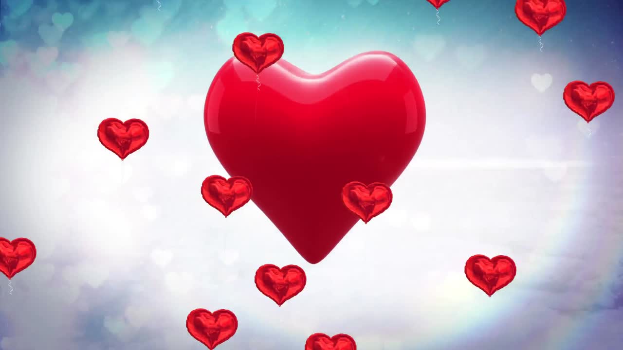 여러 개의 심장 모양의 풍선이 파란 하늘을 떠다니고 있습니다.