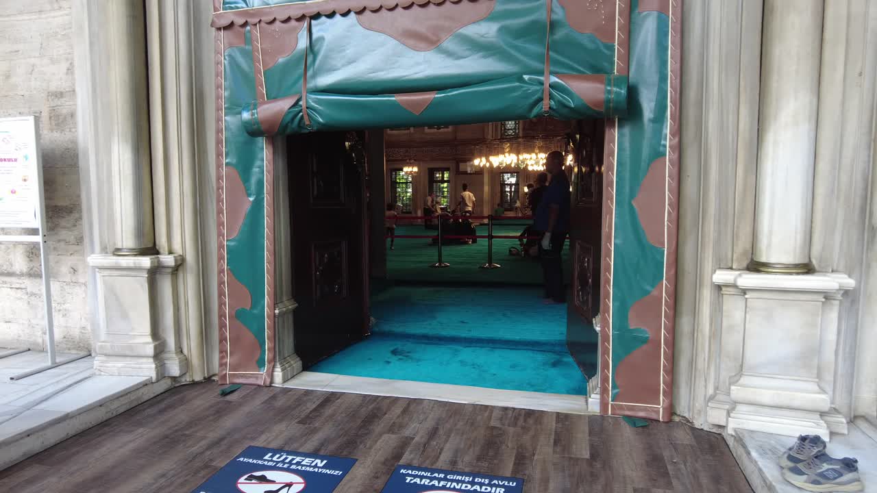 People Entering a Mosque in Istanbul, Turkey