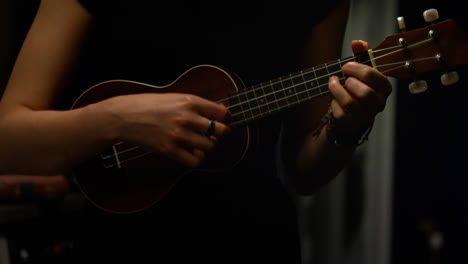 woman playing a guitar