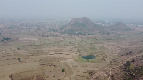 Drone-video-shot-of-vast-area-after-harvesting-in-plateau-region