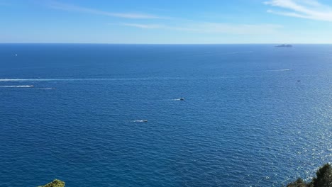 push through an open window in praiano, italy to an ocean view of boats on the gulf of salerno