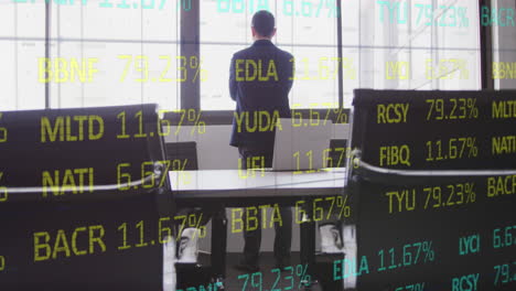 animation of financial data processing over rear view of businessman looking out of window at office