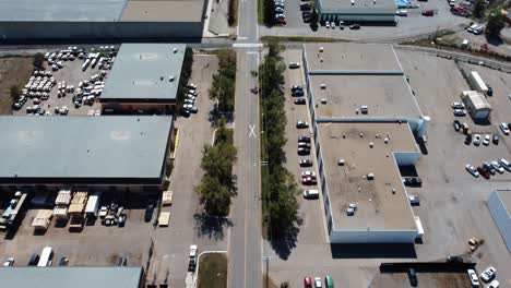 Revealing-Drone-Shot-of-the-Endless-Warehouses-Area-in-Calgary,-Alberta