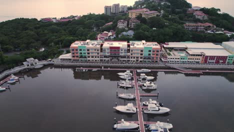 aerial shot of the brand new yacht harbor build between marina flamingo beach and playa potrero with many sailing and fishing boats docked in guanacaste, costa rica