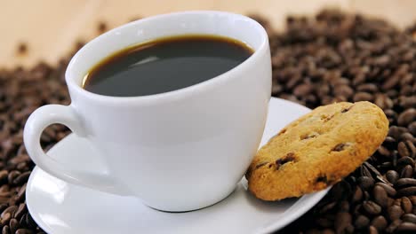 café con galleta en frijoles tostados