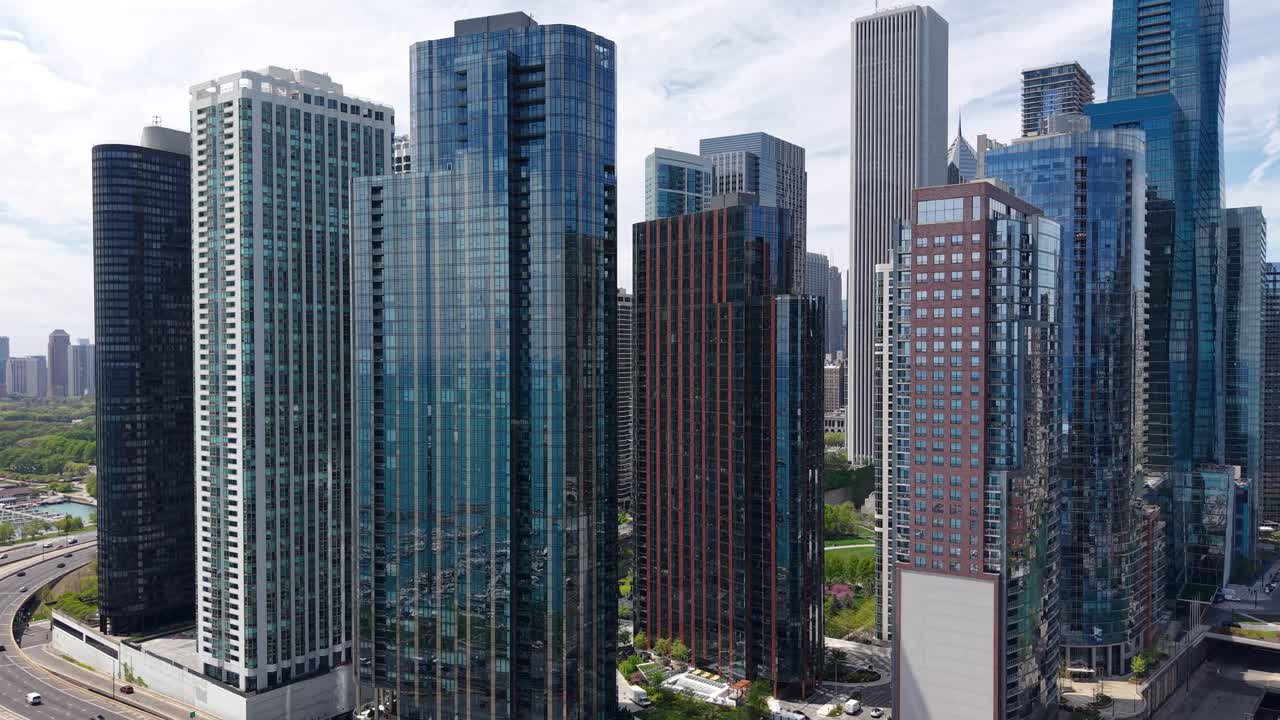 Chicago USA, Drone Shot of Traffic on Lake Shore Drive and Modern Apartment and Condo Buildiings