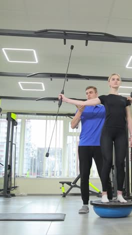 physical therapy session with balance ball exercise