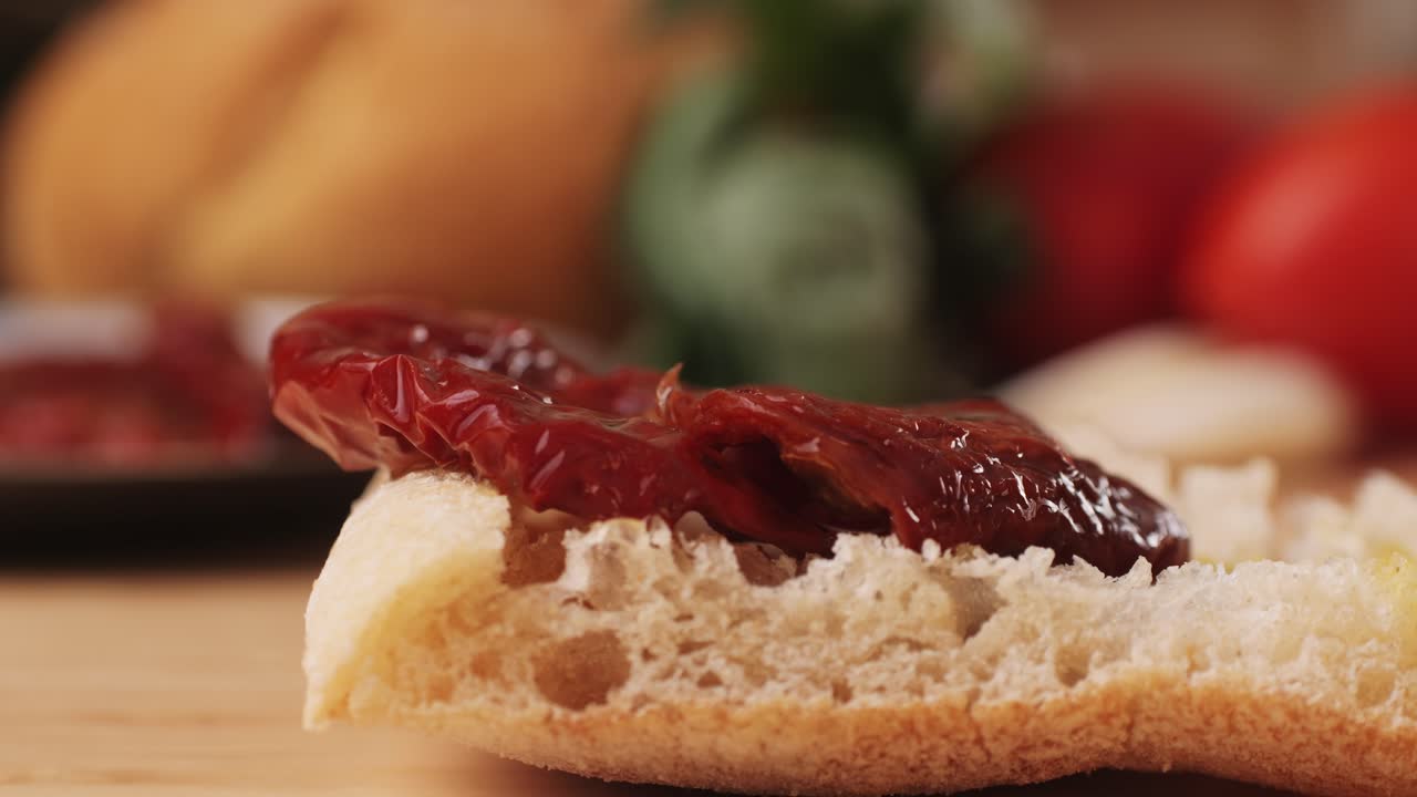 Dried tomatoes close up, Italian restaurant with traditional food, Spanish cuisine, delicious tapas and white wine, bruschetta with cheese, olives dry tomatoes and tasty sandwich bar appetizer, buffet