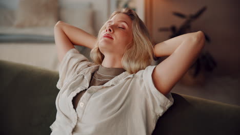 woman relaxing on couch