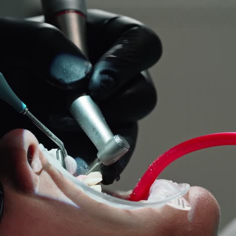dentist performs medical manipulations