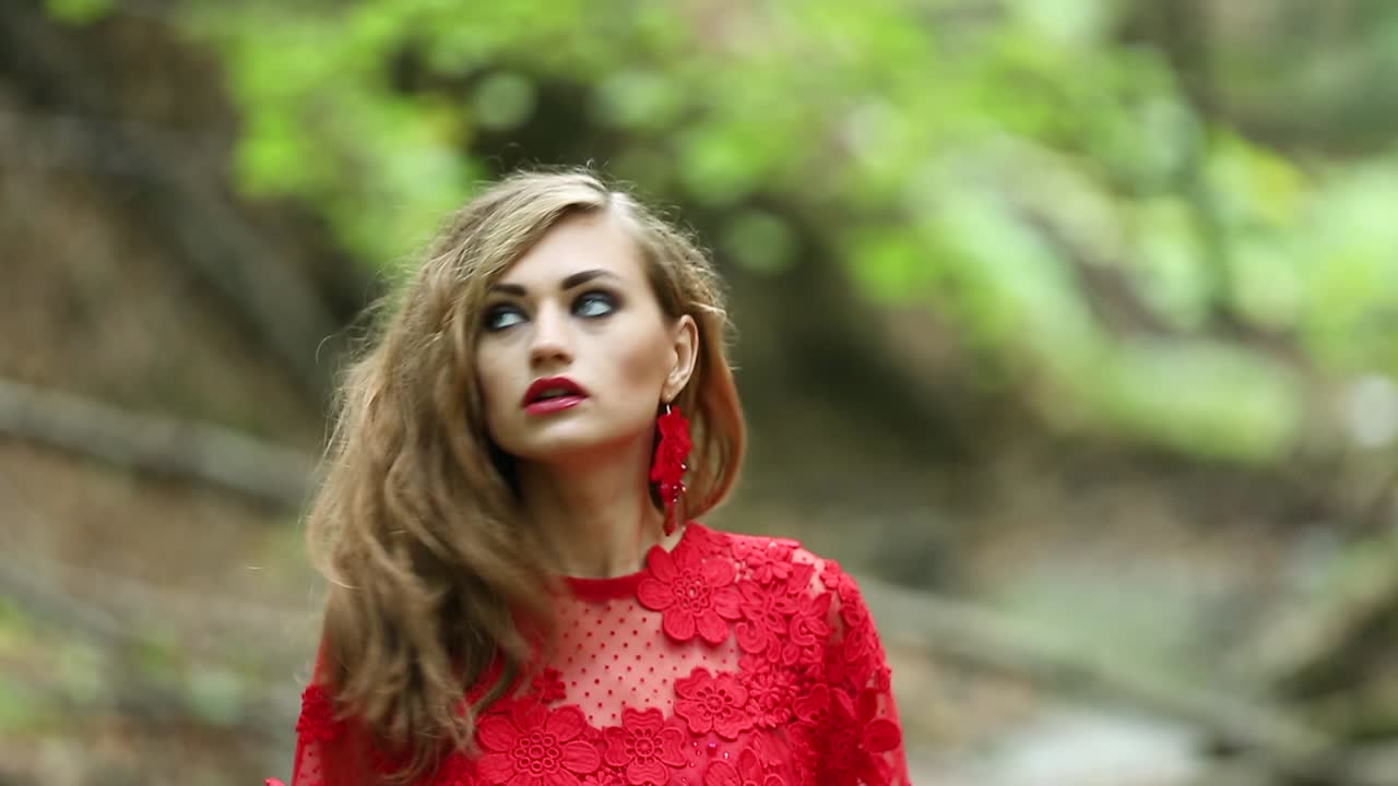 Fantasy Woman Lost In The Woods. Fantasy woman in long red dress lost in the woods