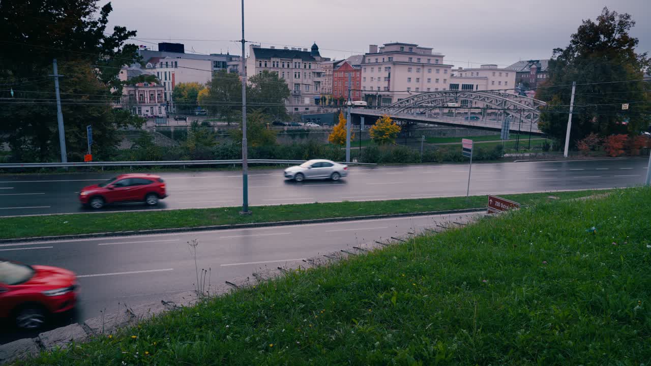 City traffic daily commute with Milos Sykora bridge backdrop Ostrava