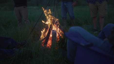 night nighttime campfire in the colorado mountains in slow motion