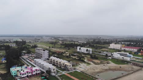 Aerial-view-of-hotel-chains-in-the-beach-of-Mandarmani,-India