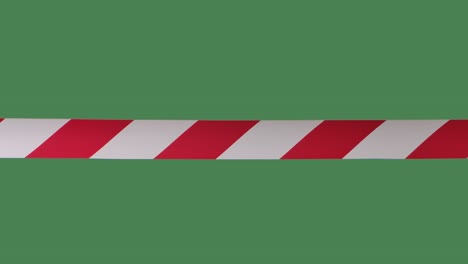 signal red and white stripes, artificial fence to restrict. it is forbidden to cross the danger zone. quarantine precautions. close up in slow motion