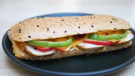 grilled chicken sandwich with cheese and vegetables