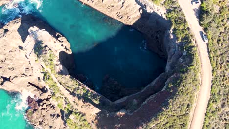 Bird's-eye-drone-scenic-view-of-Lake-Munmorah-State-Conservation-Area-Snapper-Point-Cove-Rock-cave-Pacific-Ocean-Central-Coast-NSW-Australia-3840x2160-4K