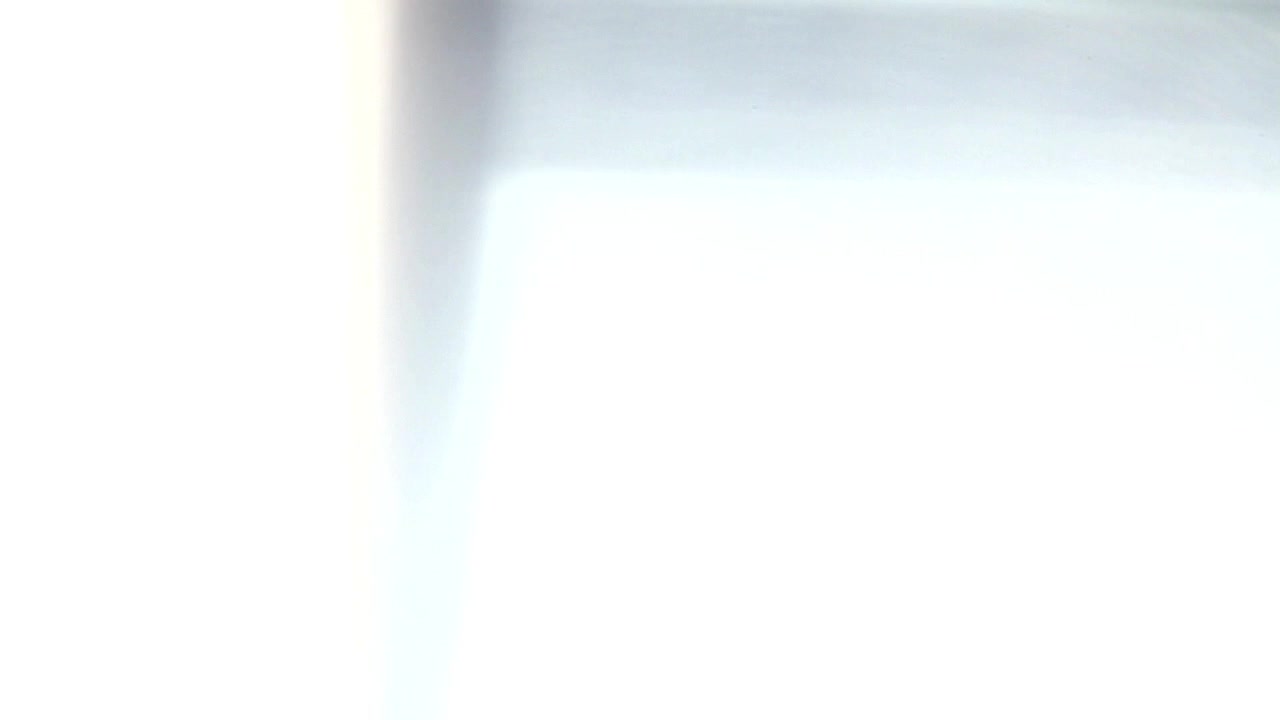 Vintage Film Strip Moving with Light Leaks and Perforations