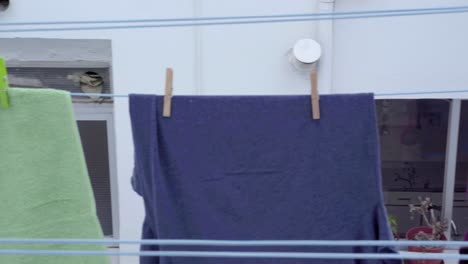 Closeup-view-of-laundry-hanged-on-ropes---PANNING-LEFT