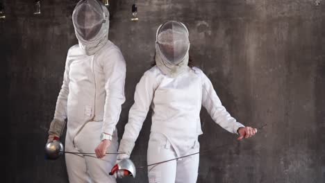 two women fencing