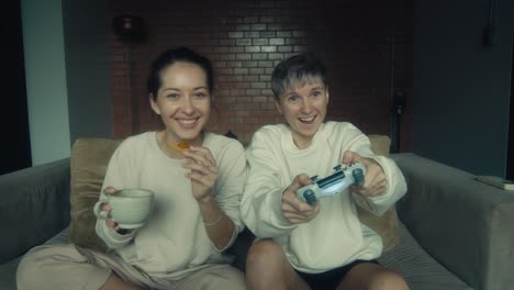 two friends enjoying a gaming session at home