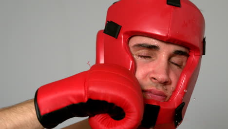 Tough-boxer-taking-a-punch-to-the-face