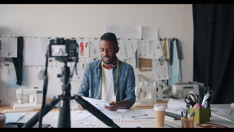 fashion designer demonstrating clothing design